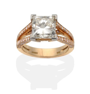 Lot 369 - An 18 Carat Rose Gold Princess Cut Diamond Solitaire Ring, by Boodles, in a white claw setting,...