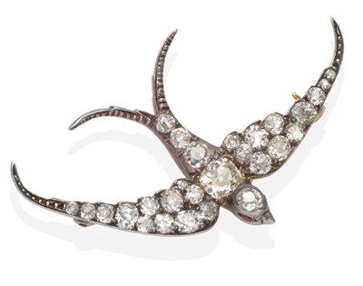 Lot 379 - A Diamond Swallow Brooch, realistically modelled and set throughout with old cut diamonds in...