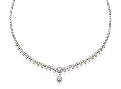 Lot 422 - A Diamond Necklace, a central old cut diamond within a border of smaller old cut diamonds in...