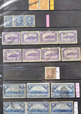 Lot 153 - Canada Dealers Stock - Large mainly used stock filling a large box in 4 large binders and 4...