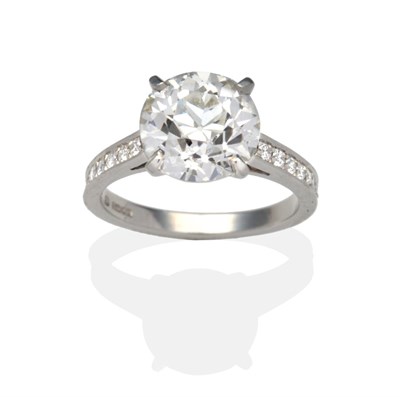 Lot 439 - A Platinum Diamond Solitaire Ring, a round brilliant cut diamond in a claw setting, to diamond...