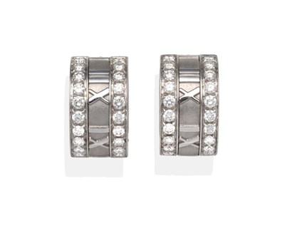 Lot 442 - A Pair of 18 Carat White Gold Diamond Set 'Atlas' Cuff Earrings, by Tiffany & Co., bright...