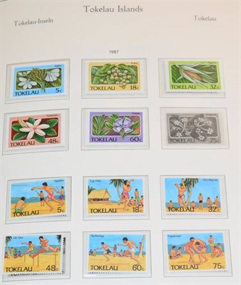 Lot 233 - New Zealand - 1972 to 2000 Collection in Four Luxury Boxed Hingeless Albums. Appears virtually...