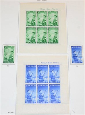 Lot 245 - New Zealand Collection in a pre printed SG album with main value in Health Mini Sheets.