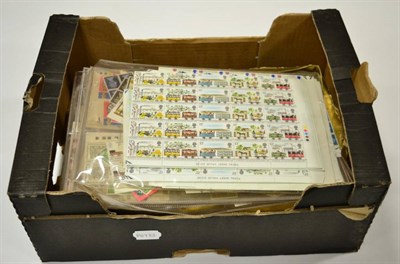 Lot 321 - Small Box Of GB and Isle Of Man in 2 albums and packets, main value in pre and post decimal in full