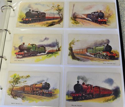 Lot 480 - Railway Postcards - In a fine large album - Vintage mainly Edwardian. With Famous Express Oilettes