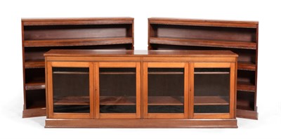 Lot 717 - An Arts & Crafts Hubert Simpson of Kendal Mahogany Three Section Bookcase, the central glazed...