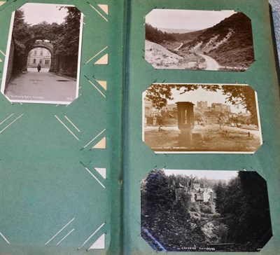 Lot 512 - Vintage Postcards - North Yorkshire and the North East - Contained in 2 old worn albums. Mainly...