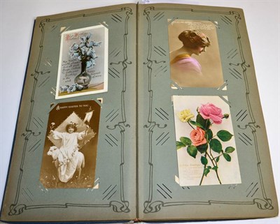 Lot 525 - A large vintage album of postcards with a variety of types including novelty, topographic,...