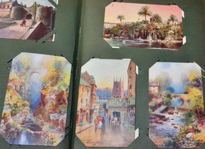 Lot 542 - Vintage Postcards - Tucks Oilettes. Two large old albums containing mainly Tucks Edwardian and...