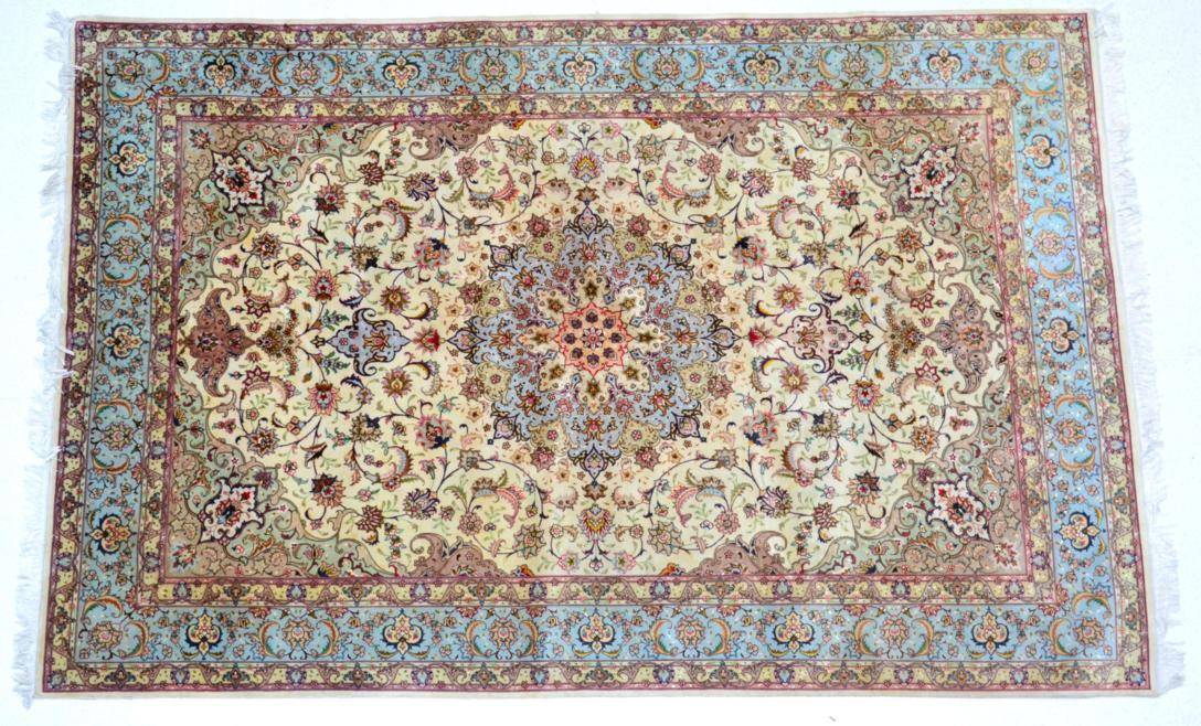 Lot 754 - Fine Part Silk Tabriz Carpet Iranian Azerbaijan, late 20th century The cream field of scrolling...