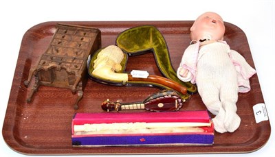 Lot 3 - A miniature chest on stand, a carved ivory pipe, early 20th century, a cased smoking pipe depicting