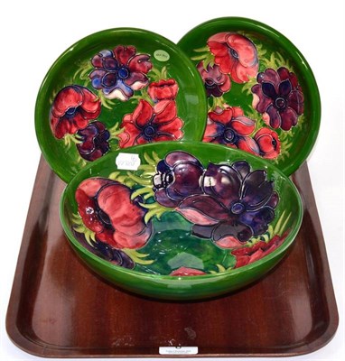 Lot 6 - A Moorcroft pottery Anemone pattern bowl with painted and impressed marks, 26cm diameter; and...
