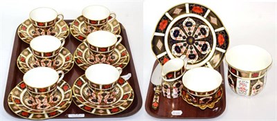 Lot 13 - A group of Royal Crown Derby Imari tea wares comprising six tea cups, saucers and side plates,...