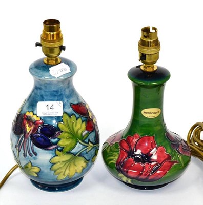 Lot 14 - A Moorcroft pottery Columbine pattern table lamp, 26cm high, including fittings; and a...