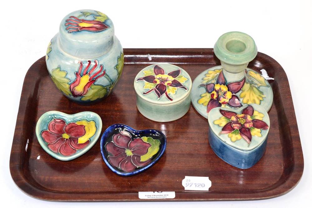 Lot 16 - Moorcroft pottery Columbine pattern items comprising: ginger jar and cover; candlestick; two lidded