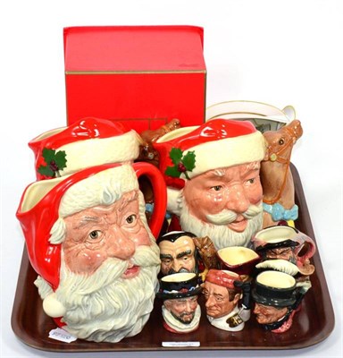 Lot 20 - Three Royal Doulton Santa Claus character jugs; seven miniature Royal Doulton character jugs; and a