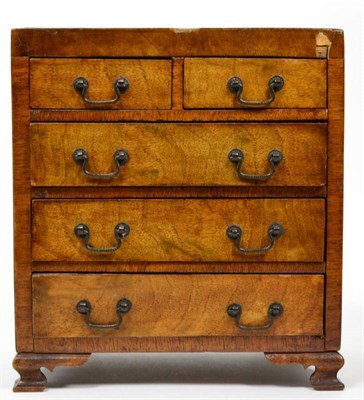 Lot 32 - A 19th century miniature mahogany four height chest of drawers