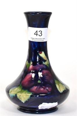 Lot 43 - A William Moorcroft pottery Pansy pattern vase with painted and impressed marks, 15cm high