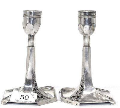 Lot 50 - A pair of WMF candlesticks