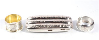 Lot 72 - A late Victorian silver three division cigar case; and two silver napkin rings