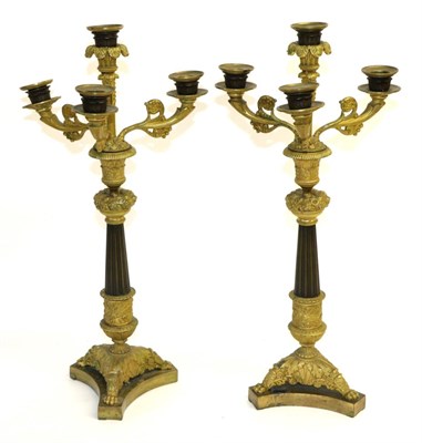 Lot 818 - A Pair of French Empire Style Gilt and Patinated Bronze Four-Light Candelabra, 2nd half 19th...