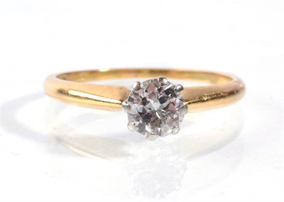 Lot 87 - A solitaire diamond ring, an old cut diamond in a claw setting, to knife edge shoulders,...