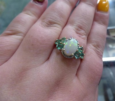 Lot 89 - A 9 carat gold opal and emerald ring, finger size Q1/2 a 9 carat gold emerald and diamond half hoop
