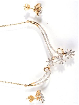 Lot 107 - A 9 carat gold articulated diamond floral necklace and earring suite, the necklace with three...