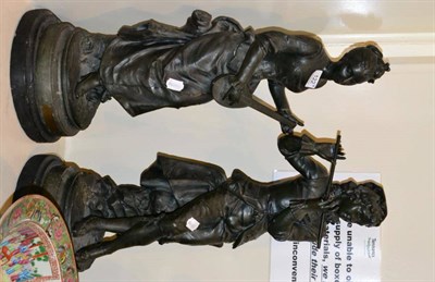 Lot 122 - A pair of patinated metal figures of musicians