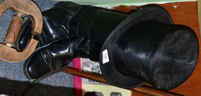Lot 131 - A Locke & Co. mole skin top hat together with a pair of Hosskins black leather riding boots, size 7