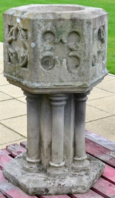 Lot 834 - A Gothic Revival Carved Stone Font, of hexagonal form, decorated with roundels on a column with six