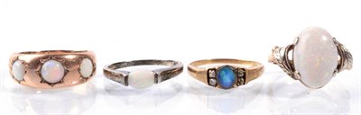Lot 155 - Four opal rings, including a Victorian opal three stone ring, stamped '9CT'; an opal ring,...