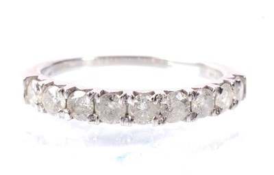 Lot 158 - A 9 carat white gold diamond half hoop ring, total estimated diamond weight 1.00 carat...