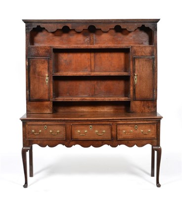 Lot 842 - A George III Oak and Mahogany Crossbanded Dresser and Rack, late 18th century, with a shaped...