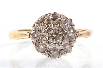 Lot 173 - An 18 carat gold diamond cluster ring, total estimated diamond weight 0.35 carat approximately,...