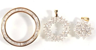 Lot 174 - A 9 carat gold diamond cluster pendant; a 9 carat gold diamond hoop cluster pendant and a 9...