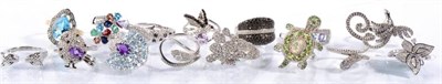 Lot 180 - 15 various silver gem set rings, including a silver gilt blue topaz cluster ring