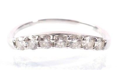 Lot 184 - A platinum diamond curved half hoop ring, total estimated diamond weight 0.55 carat...