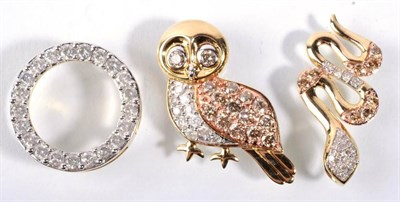 Lot 185 - A 9 carat gold white and champagne coloured diamond set owl pendan; a 9 carat gold white and...