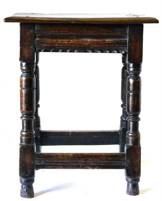 Lot 866 - An Early 17th Century English Joined Oak Stool, the four-pegged rectangular top above a moulded and