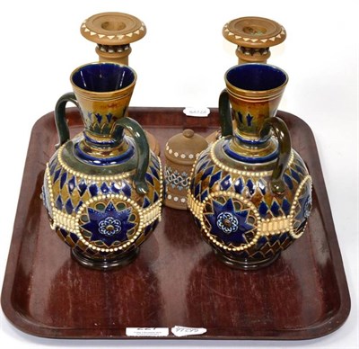 Lot 227 - A pair of Royal Doulton Lambeth stoneware twin handled vases; two candlesticks; and a match...