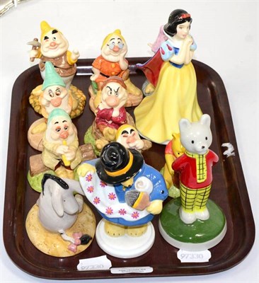 Lot 242 - A set of eight Royal Doulton Snow White and the seven dwarves figures; two Royal Doulton...