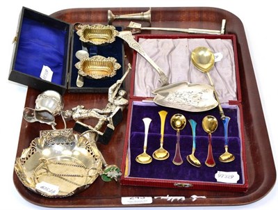 Lot 243 - A group of assorted Continental and English silver items; to include enamel coffee spoons; a...