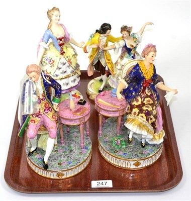 Lot 247 - Two pairs of Continental porcelain figure groups