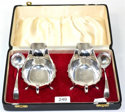 Lot 249 - A pair of silver sauce boats and ladles, Viners Ltd, Sheffield, in a fitted case