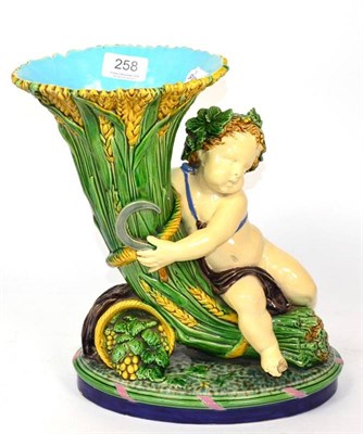 Lot 258 - A Minton Majolica cornucopia vase in the form of a corn sheaf