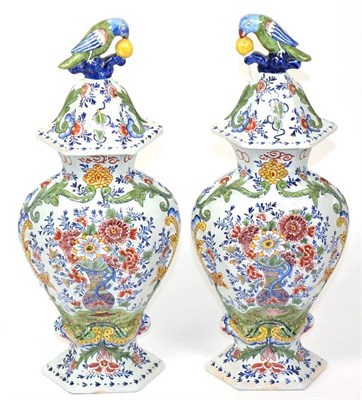 Lot 263 - A pair of Dutch Delft vases and covers