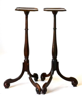 Lot 914 - A Pair of George III Mahogany Tripod Candlestands, early 19th century, of octagonal shaped...