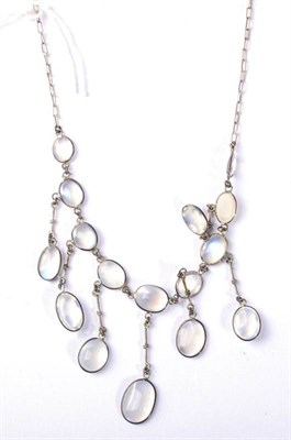 Lot 275 - An early twentieth century moonstone necklace, the front with graduated oval moonstone...